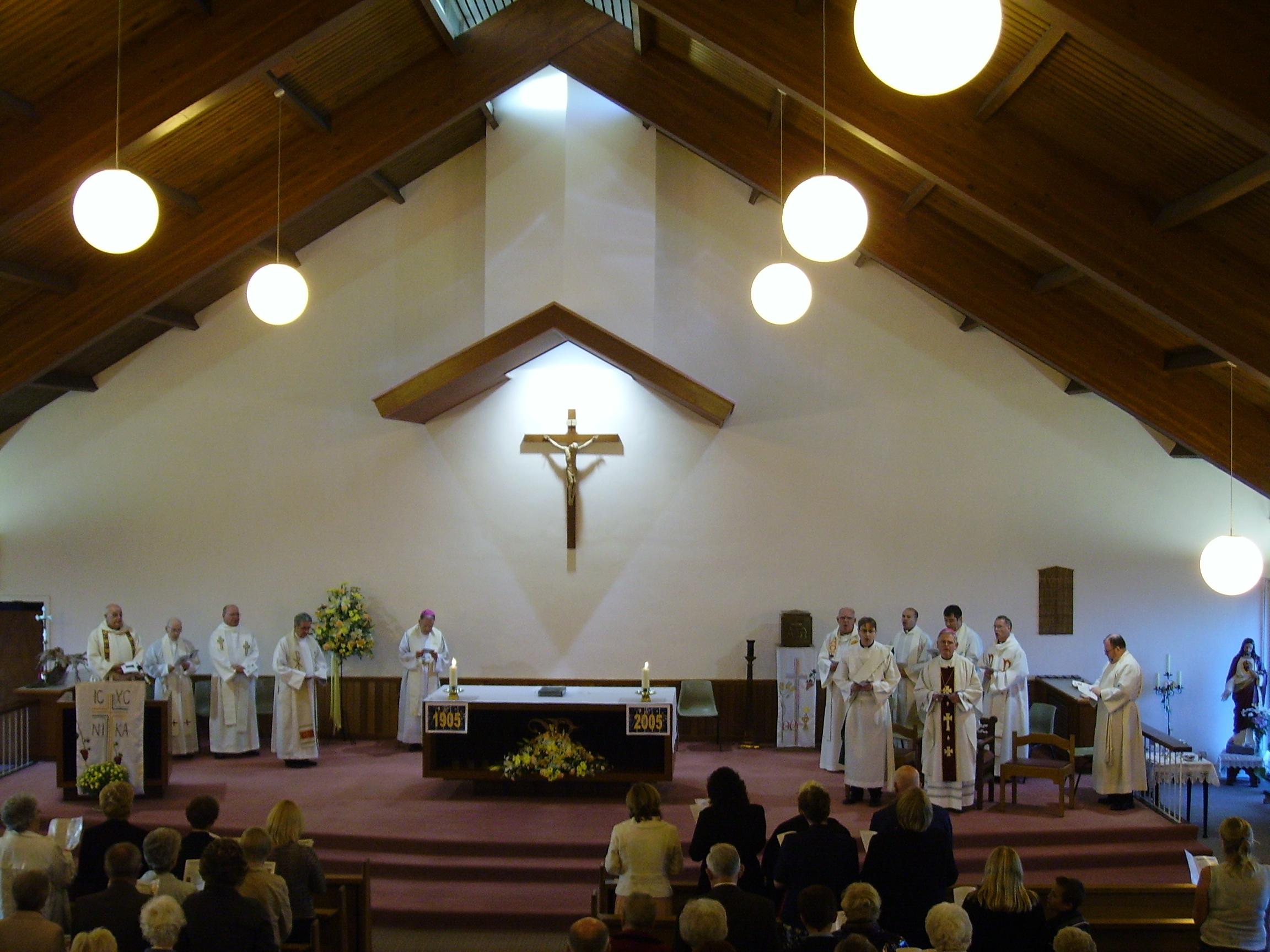 Left to right - Fr. Eddie McGee, Fr. O'Rourke (St. Michael's, Glasgow), Fr. Matt McManus, Fr. Martin Poland (current Parish Priest), Bishop Maurice Taylor (Bishop Emeritus), Canon John Walls, Rev. Mark Kelly (deacon), Fr. David Conroy, Fr. Alan Wilson, Bishop John Cunningham, Fr. William McFadden, Philip Kitchen (student).